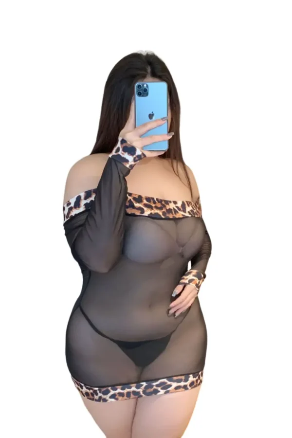 Plus-size model wearing B2B leopard print sexy lingerie with sheer mesh and animal print details.