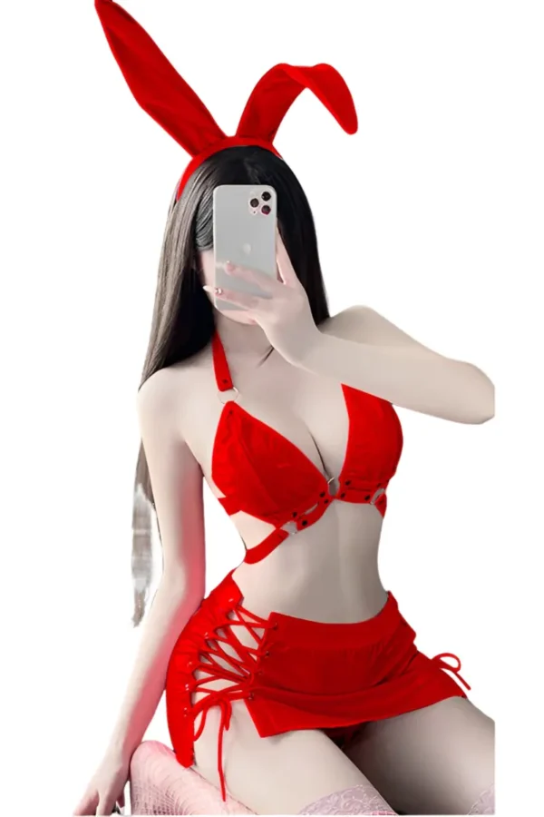 Woman dressed in bulk bunny themed red lingerie with bunny ears