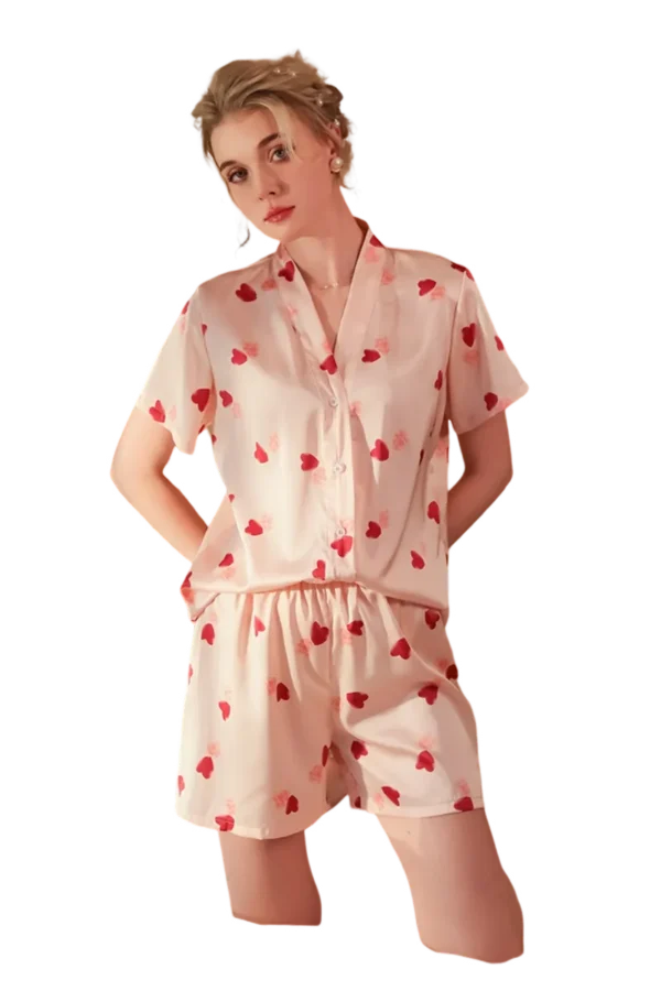 Bulk comfy sexy loungewear set with short sleeves and matching shorts, adorned with pink and red heart prints.