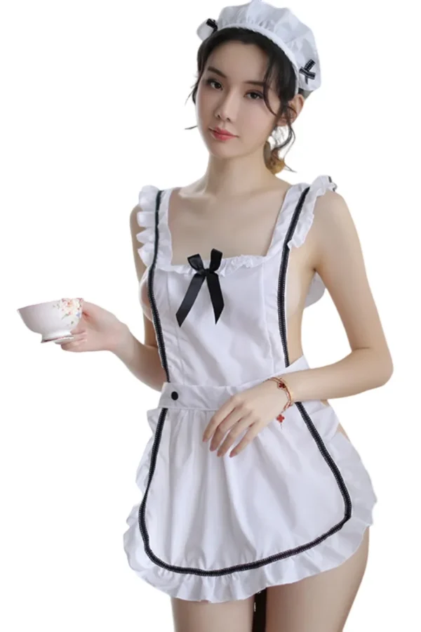 Model wearing classic private label sexy maid lingerie with a black bow and white apron