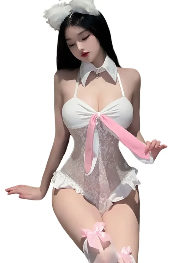 Woman wearing b2b Bunny suit lingerie in white lace with pink bow detail.