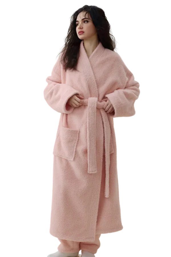 Woman in private label sexy warm pink loungewear robe