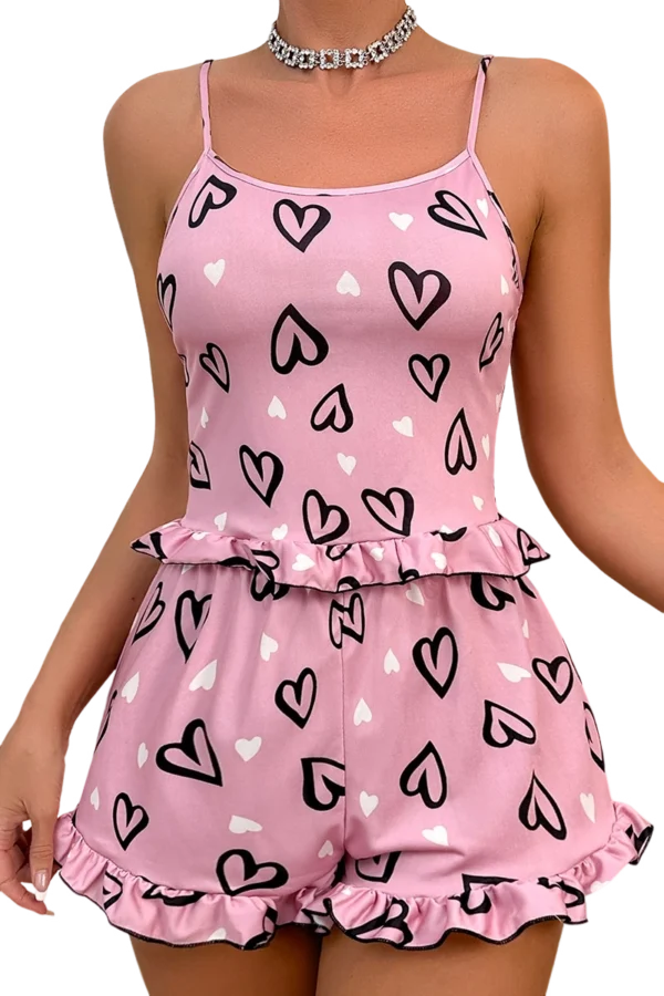 B2B pink lace nightgown featuring heart print and ruffled hem, front view.