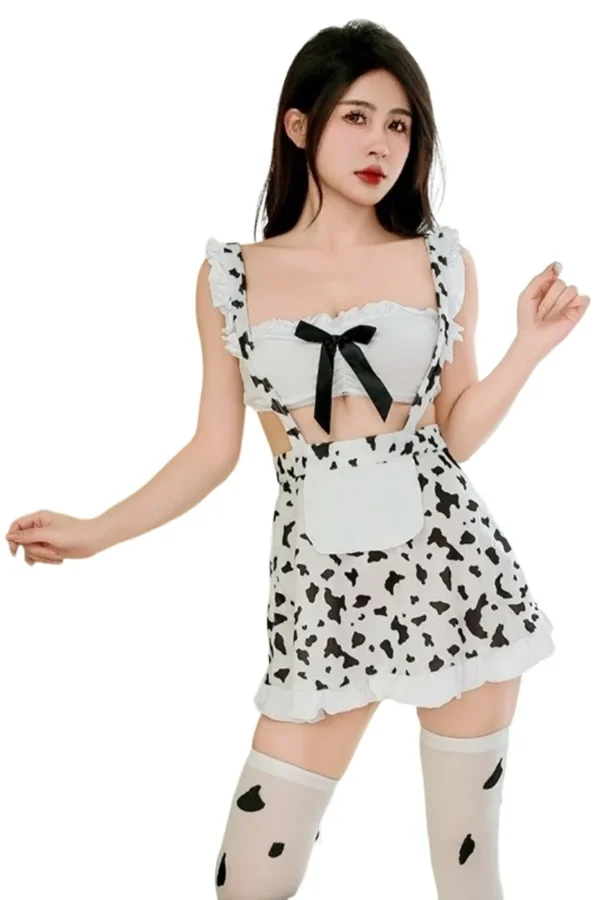 Woman posing in cute wholesale sexy loungewear for women with cow print and suspender straps