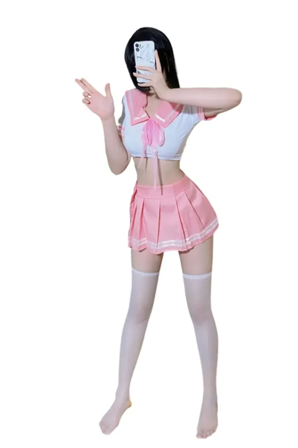 OEM school girl sexy costume in pink, featuring a cropped top and pleated skirt
