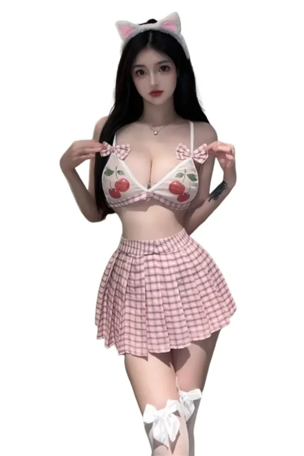 Woman wearing a cherry print bra and pink plaid skirt, wholesale sexy loungewear.