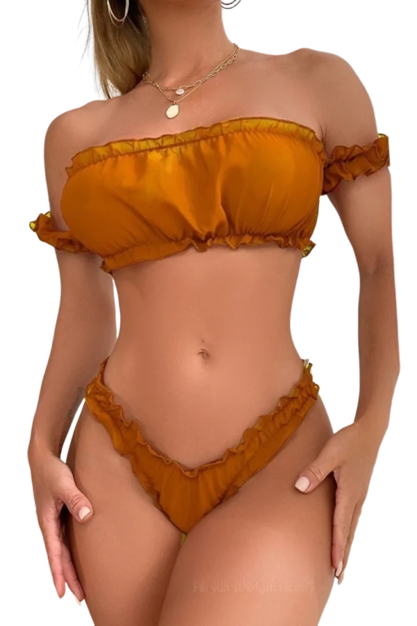 Close-up of golden B2B lace sheer nightgown showcasing intricate lacework.