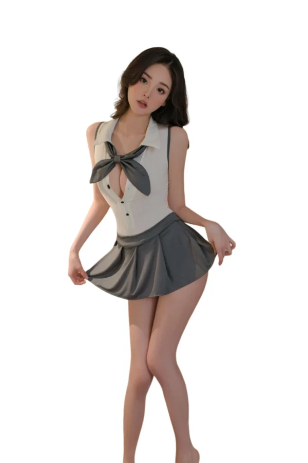 Standing pose showcasing private label stockings naughty school lingerie with pleated skirt.