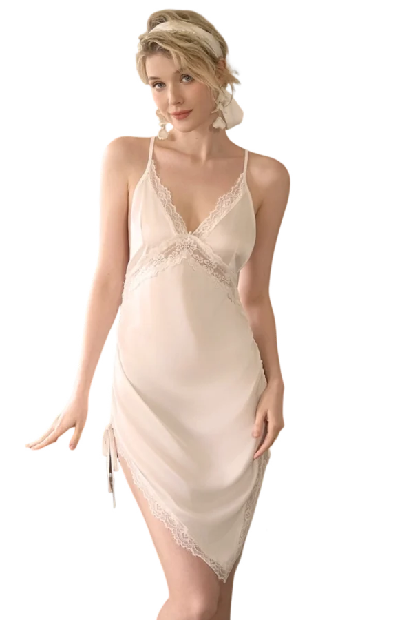 Back view of a white B2B knee length lace nightgown with crisscross straps and intricate lace details.