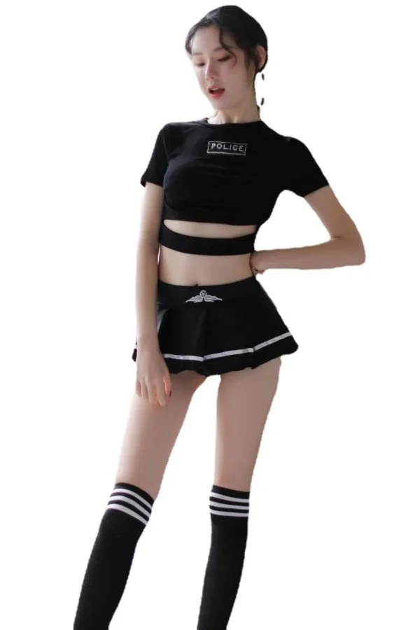 Woman modeling a fashionable black B2B cop costume women set with a cropped top and skirt.
