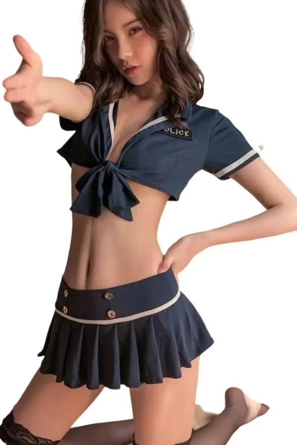 Wholesale Womens Cop Costume - Command Attention - Supreme Lingerie A wholesale women's cop costume with a tied navy blue shirt and pleated skirt.